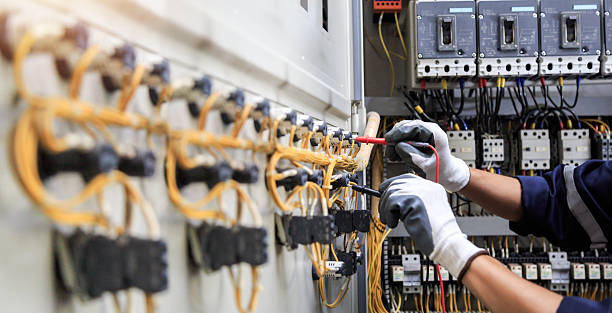 Professional Electrician technician working in Aurora, IN